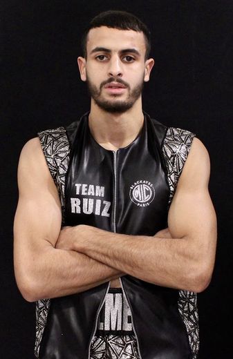 Béziers boxer Jaouad Belmehdi tackles a rock