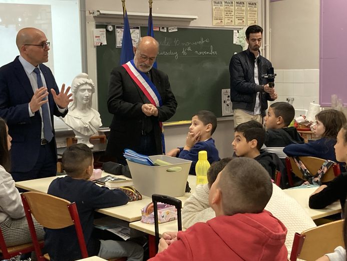 The mayor plays schoolteacher in front of his young colleagues from the junior municipal council of Bagnols