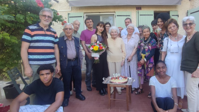 A centenarian celebrated by her neighbors