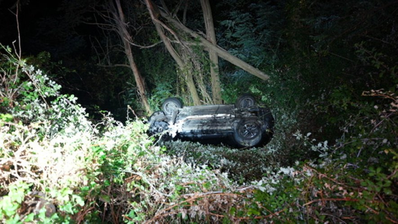 The car left the road and fell into a ravine, rolling several times.